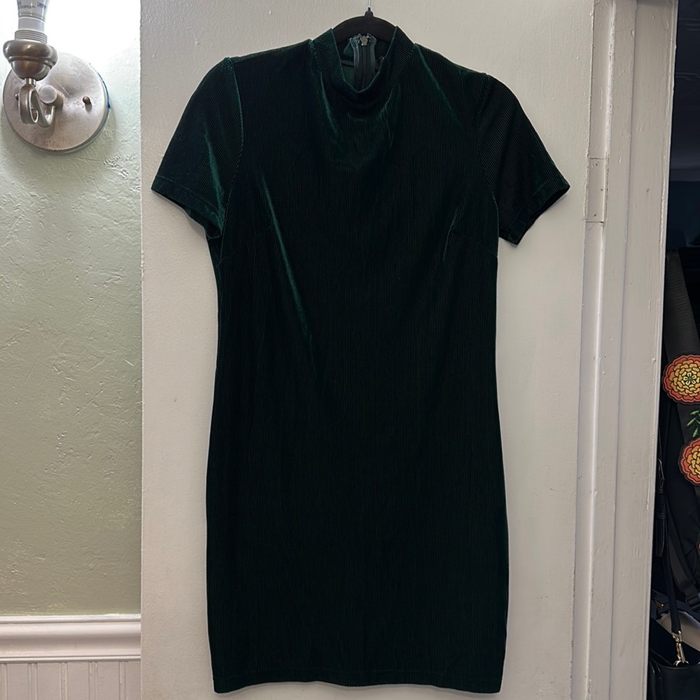 Emerald green velvet dress